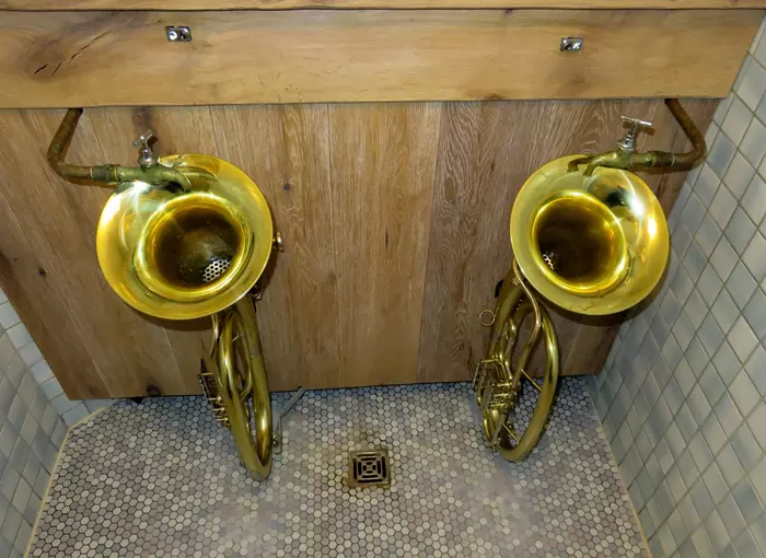 Trumpet shaped urinals
